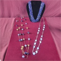 3 Necklaces - the one with gold Colored balls is