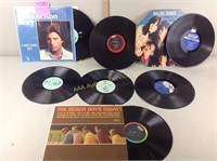 Vinyl records including the beach boys, rolling