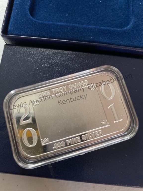 One troy ounce 2001 silver bar