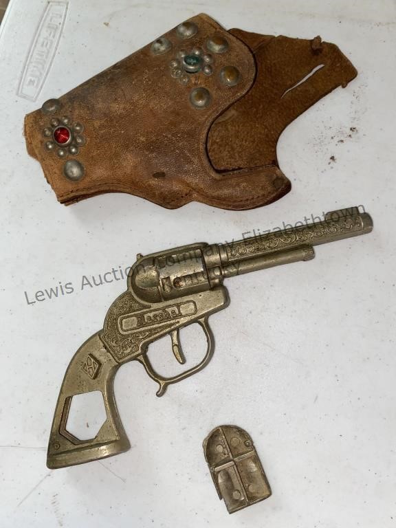 vintage Hubley toy cap gun revolver with leather