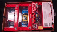 Eight 1/24 scale NASCAR cars in original boxes