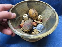 Pottery bowl w/ interested items