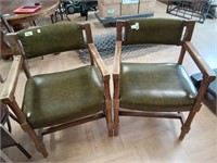 >Wood armed chairs with green upholstery with