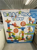 Roll and bounce tower toy
