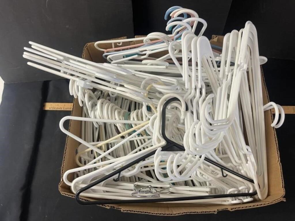 Box of plastic clothes hangers