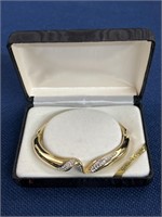 Genuine Crystal gold tone hinged bracelet