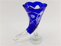 Cobalt cut glass horn shaped vase. Approx 12" tall