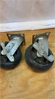 Two 7 inch industrial casters