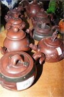 Set of 10 Yixing covered teapots, various sizes &