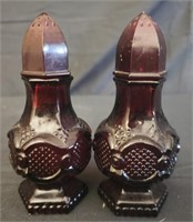 Pair of salt shaker charisma cologne bottles