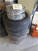 Four Goodyear Eagle tires,