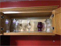 Contents of shelf hurricane glasses