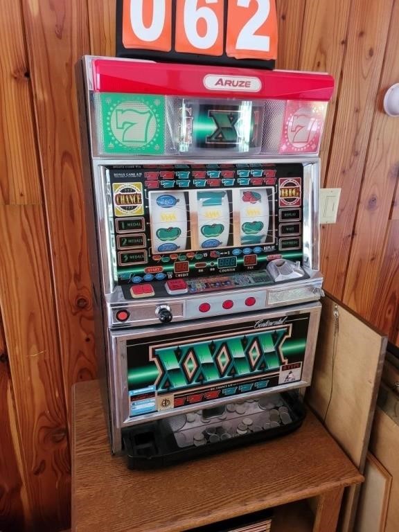 slot machine Aruze takes tokens