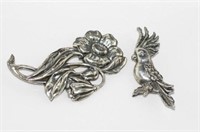 Two silver brooches (flower and cockatoo)