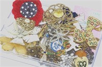 Various costume brooches