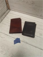 two leather wallets