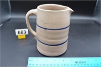 Hand crafted blue line pottery pitcher