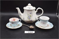 Tea Pot And Tea cups, tea strainer,  saucers