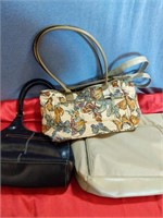 Three smaller purses/ hand bags