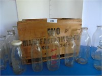 Crate and several Milk and Juice bottles