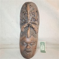 Carved wood Papua New Guinea tribal mask