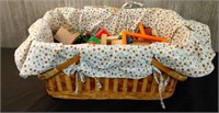 Wicker picnic basket with assorted wood block toys