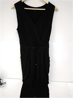 Worn medium cotton jumpsuit, some bleach spots