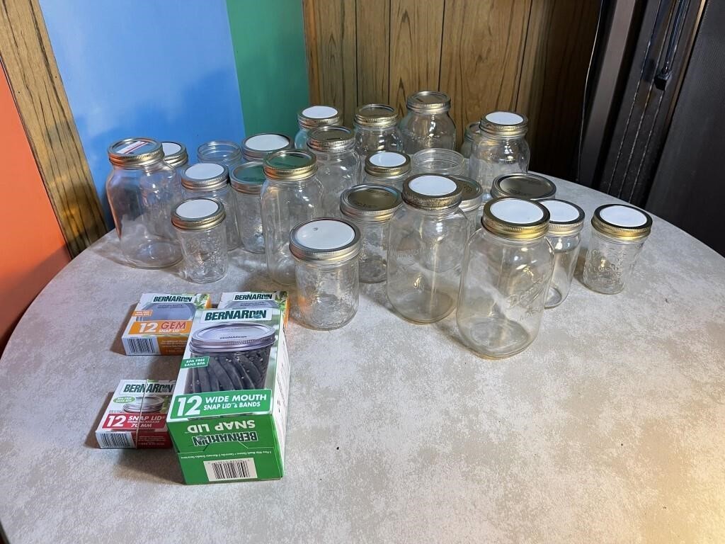 Canning jars with some lids