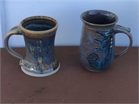 2 VINTAGE POTTERY  STEIN MUGS WITH NEAT DESIGNS