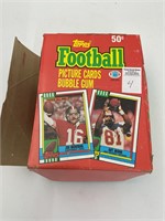 36 unopened packs of 1990 Topps football cards