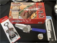 Meatloaf pan, corkscrew, Cuisinart knife, pizza