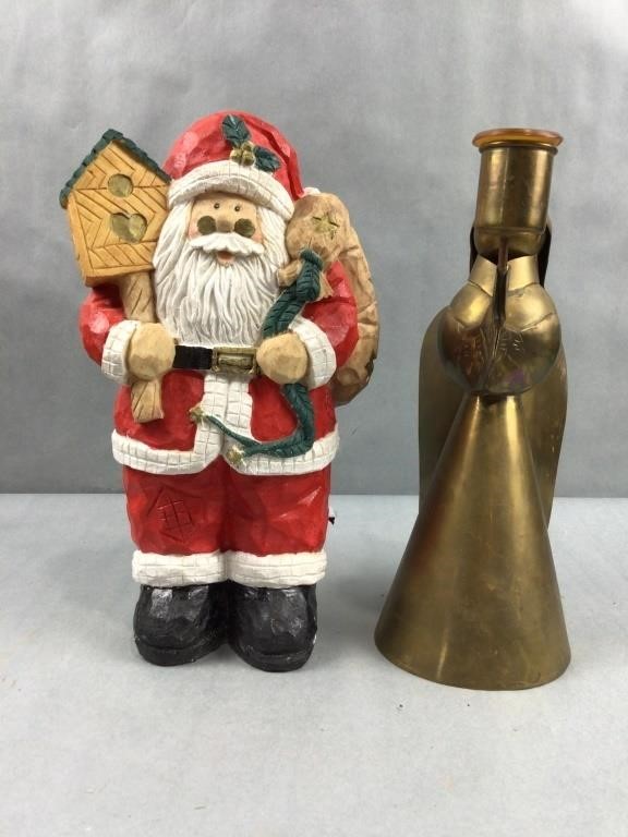 Angel candle holder with Santa statue