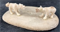 Carved wolves on whalebone vertebrae 4.5" Long