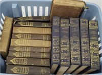 Basket of early books including Charles Dickens,