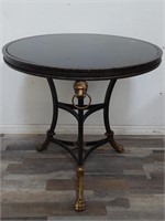 Brass & iron granite top entry table w/ lion
