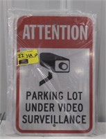 Parking lot under video surveillance sign