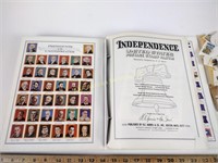 Postage stamp album with assorted postage stamps