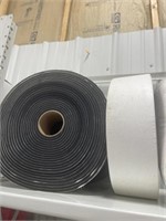 ROLL OF ADHESIVE PADDED MATERIAL
