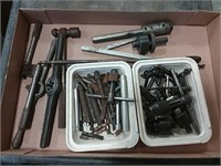 assortment of bits, handles, keys