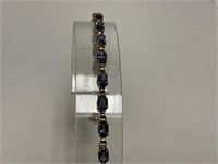 10kt Gold Blue Topaz Tennis Bracelet 4.3gr TW 7"