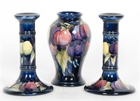 Moorecroft Three Plum Pattern, Candlesticks & Vase