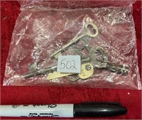 ANTIQUE KEYS IN BAG