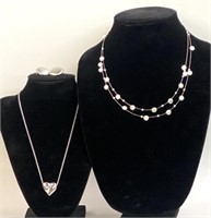 (2) Costume Jewelry necklaces, and clip earrings,