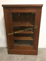 4ft tall wooden cupboard with glass door