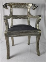 Tin-laminated wood arm chair with ram's heads