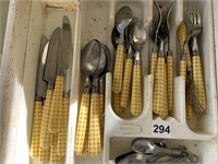 YELLOW FLATWARE AND MEASURING SPOONS