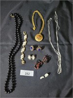 Bracelet,  3 necklaces, & 4 earrings