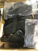 Box of holsters & more