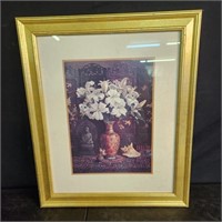 Print of lilies and Buddha, framed