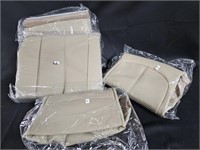 Tan, leather colored vehicle seat covers.